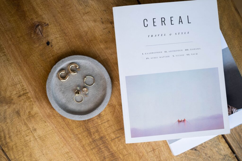 A flat lay of minimal gold jewelry