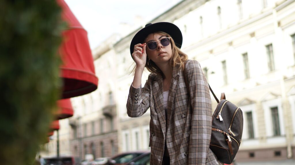A woman wearing stylish sunglasses