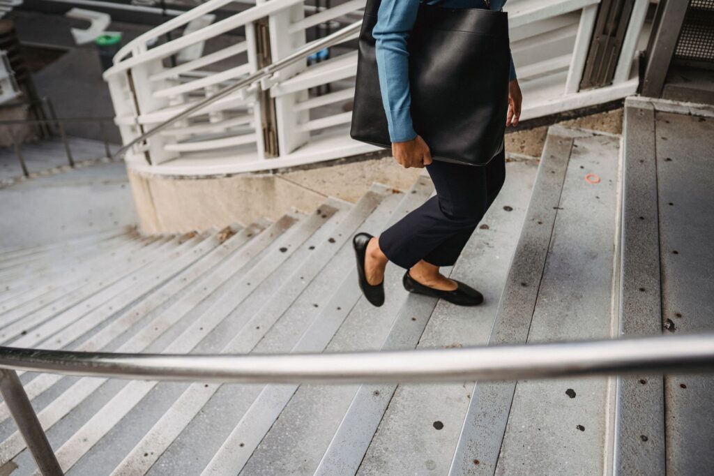 A woman commuting with a structured tote