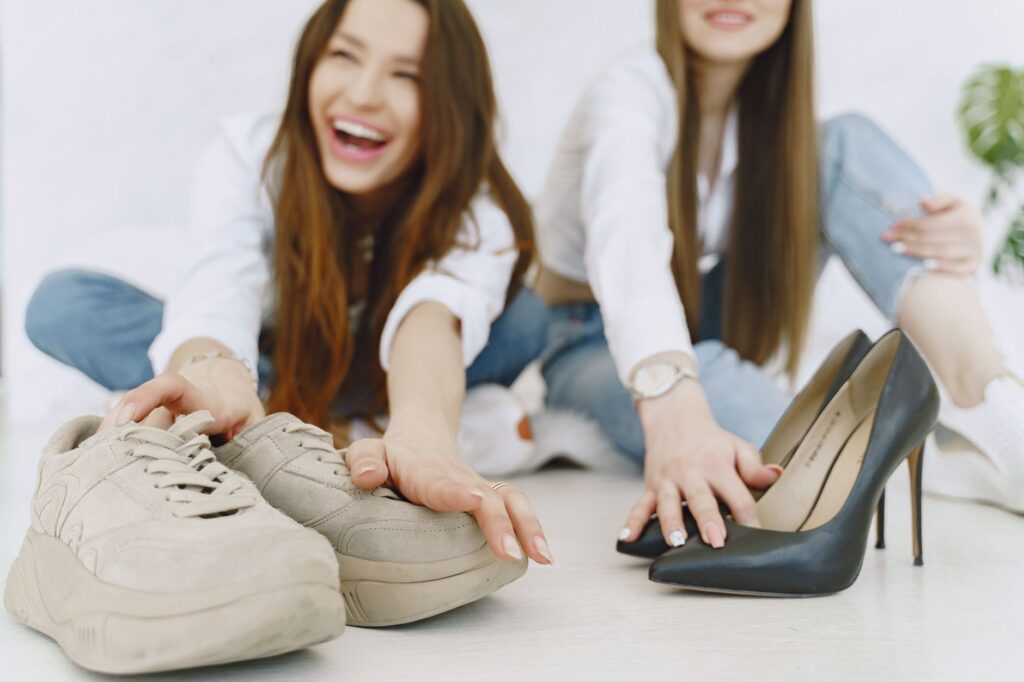 A pair of clean white leather sneakers