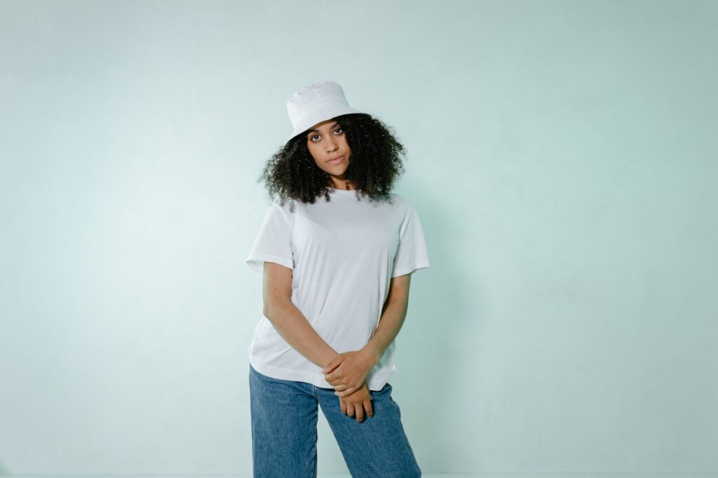 A woman in a classic white tee and jeans