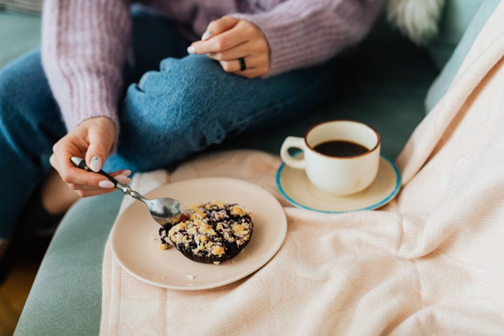 A woman in jeans and a cozy knit