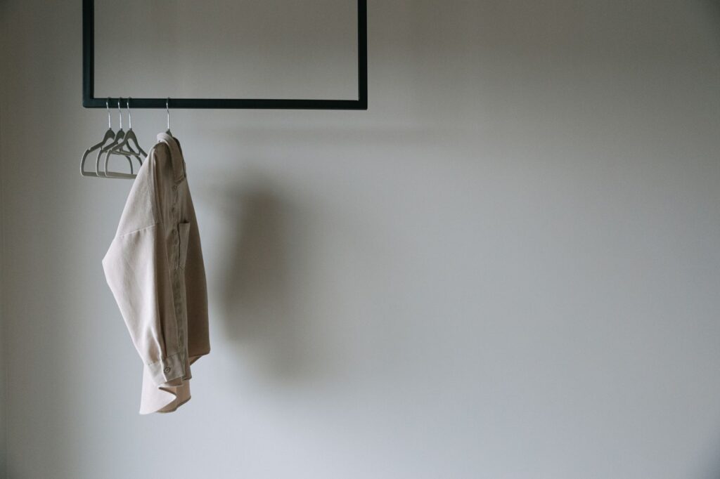 A rack of affordable neutral wardrobe pieces