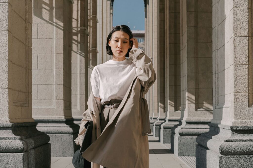 A woman in an affordable, chic neutral outfit
