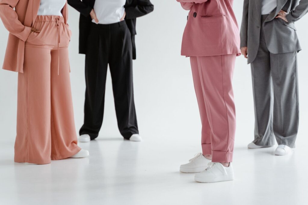 A woman in a polished business-casual outfit