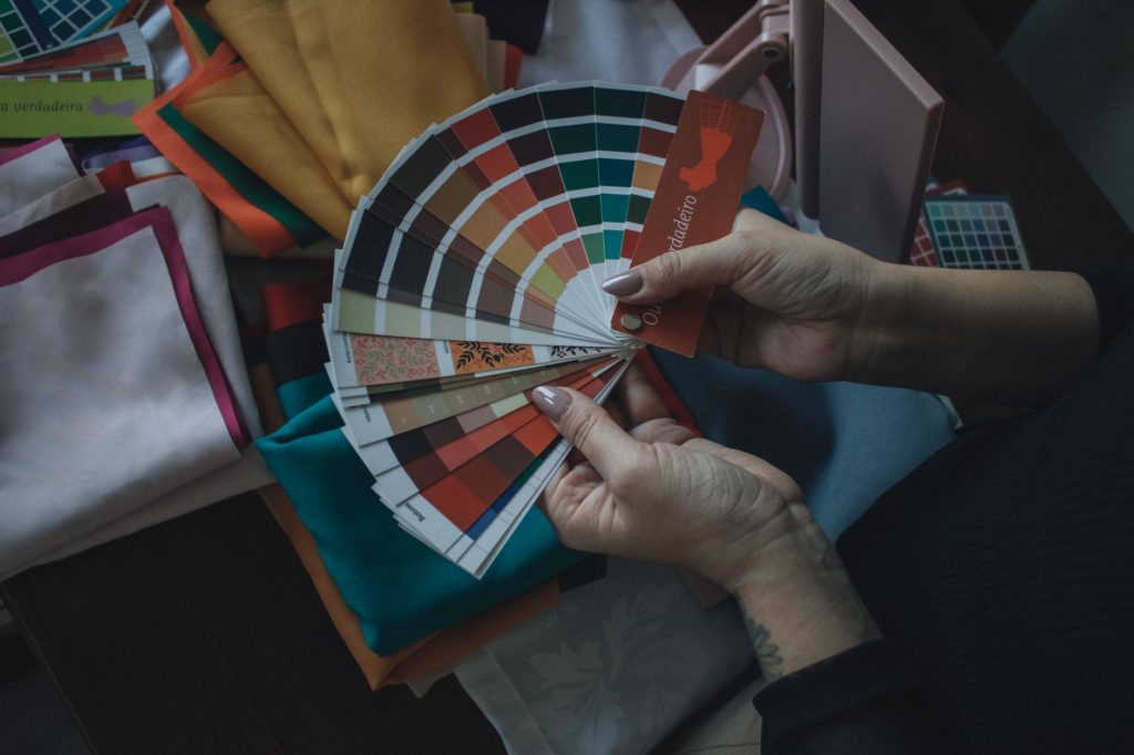 Fabric swatches of different seasonal color palettes arranged by season