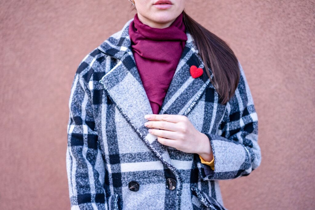 A woman in a beautifully layered autumn outfit