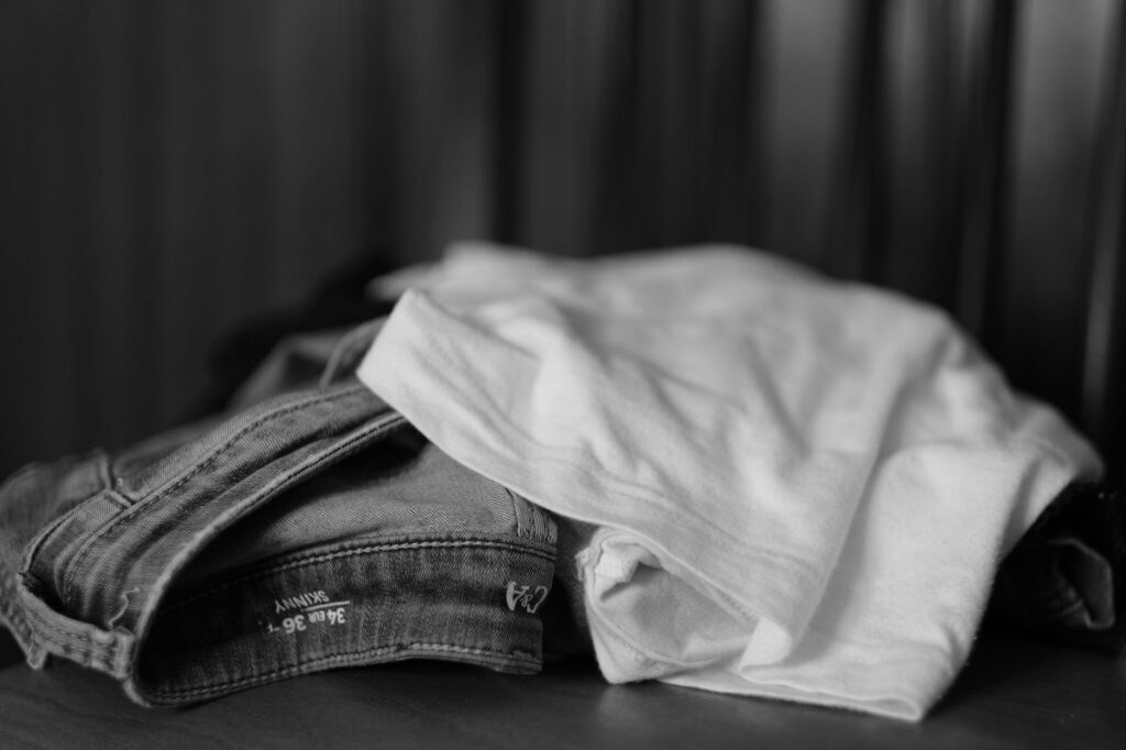A denim jacket with a white tee and jeans