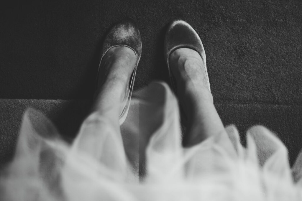 woman in midi skirt and ballet flats elegant daytime look