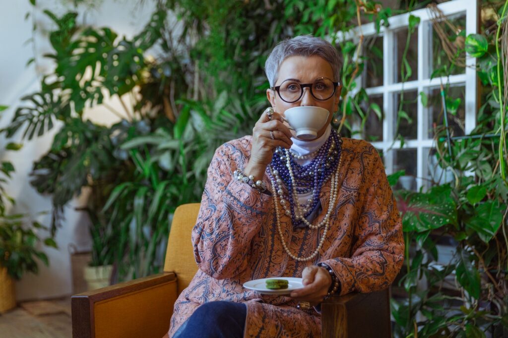 An elegant woman in a chic, modern outfit