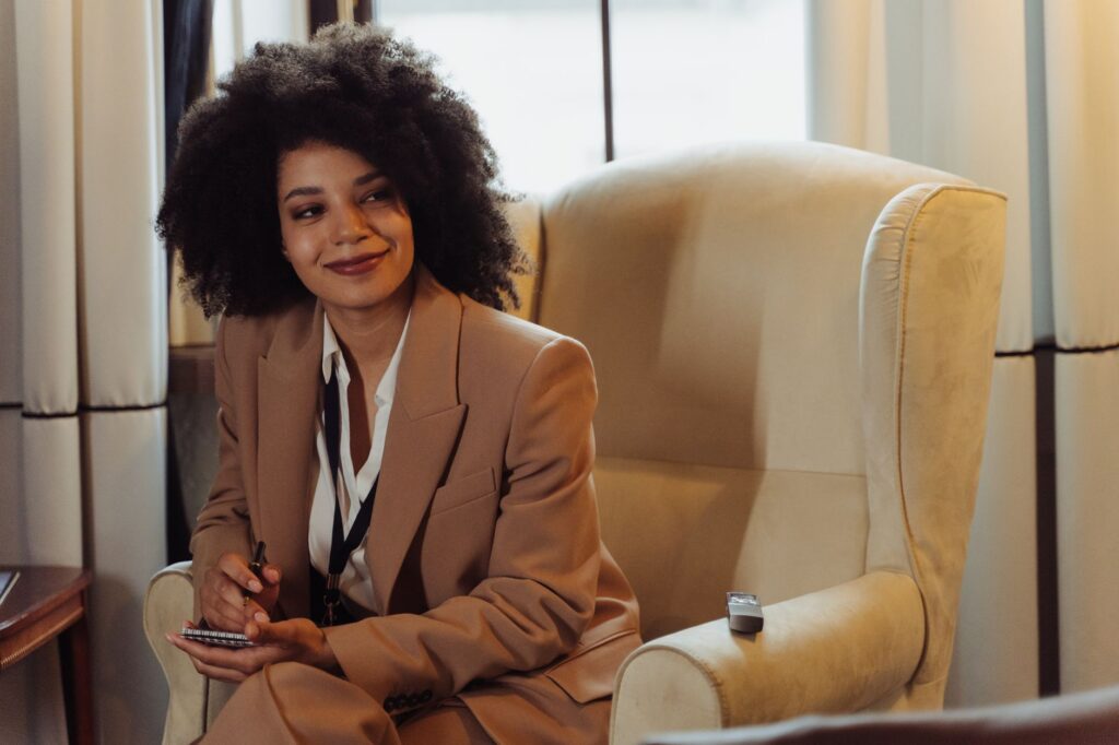 A woman in a polished interview outfit