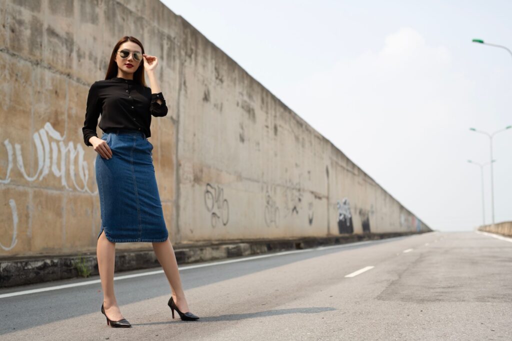 A woman in a pencil skirt and blouse