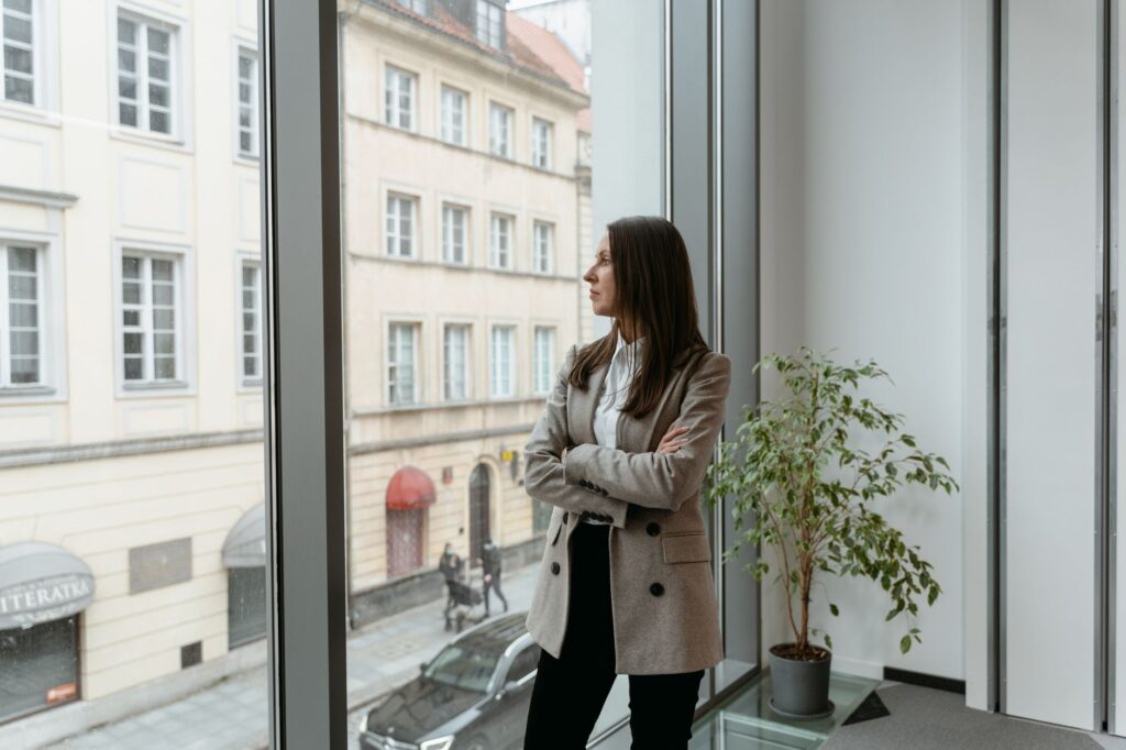 Woman wearing a business casual blazer and trouser outfit