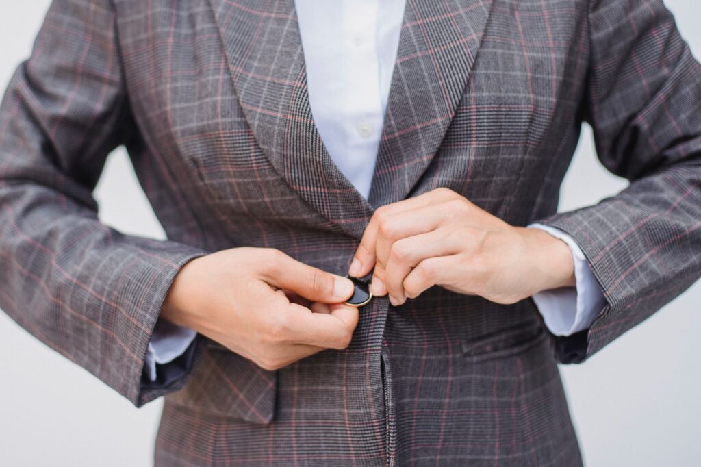 Bodysuit worn under a tailored blazer for a polished work look