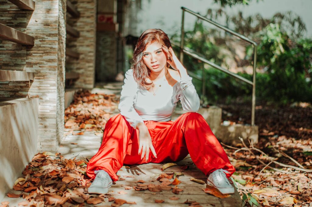 Woman styling cargo pants with a fitted top for a street style look